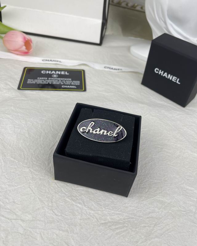 C.H.A.N.E.L Brooch 24