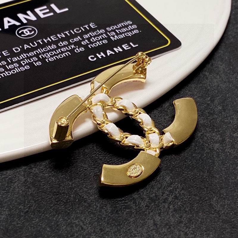 C.H.A.N.E.L Brooch 52