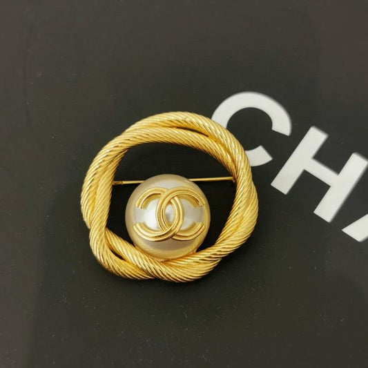 C.H.A.N.E.L Brooch 81