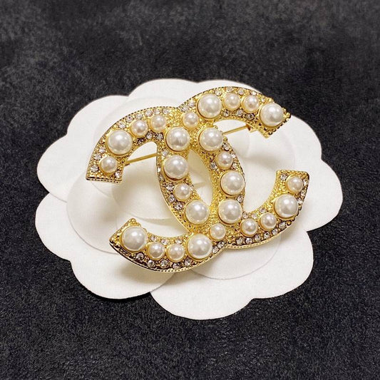 C.H.A.N.E.L Brooch 91